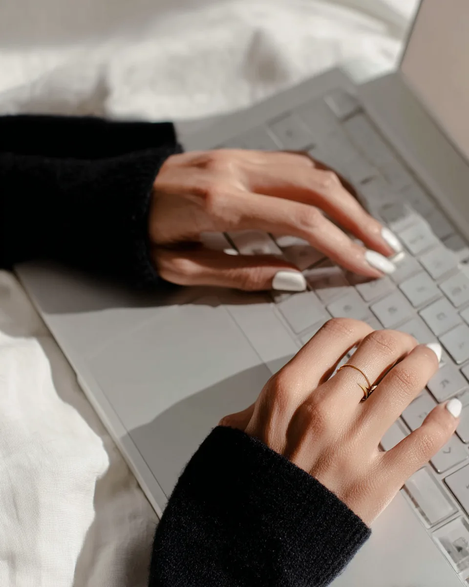 Working at a laptop - optimizing a brand to be cited by AI search engines